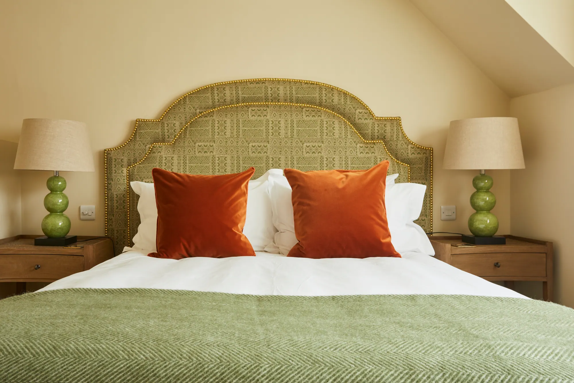 Prosperous: green and russet textiles and antique wood